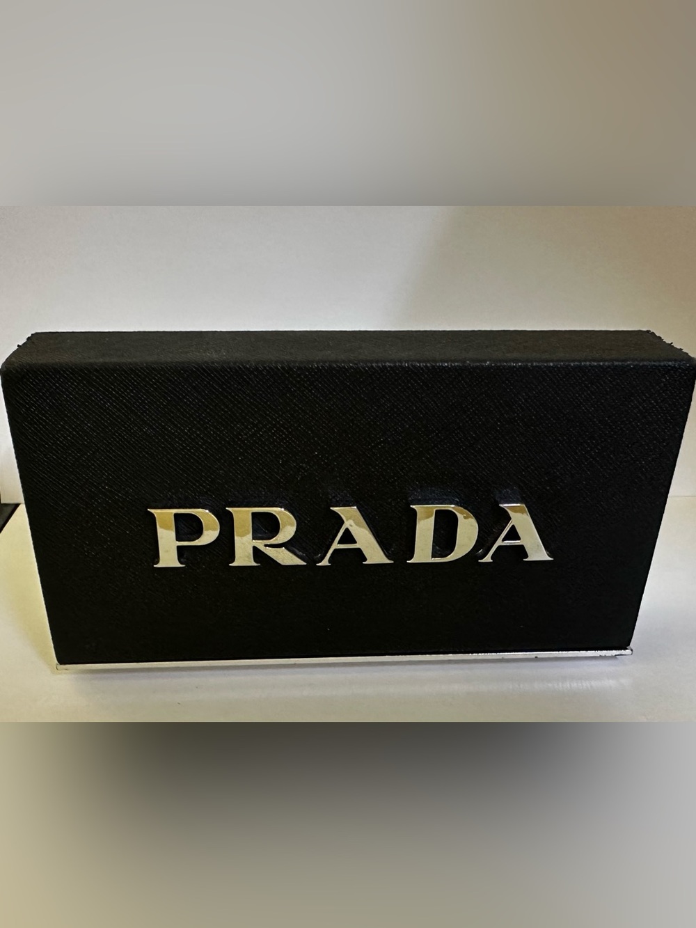 Prada display plaque